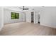 Large bedroom with ceiling fan and walk-in closet at 5341 Lake Pearl Ct, Tampa, FL 33625