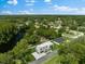 Aerial view of home showcasing its modern design and lakeside location at 5341 Lake Pearl Ct, Tampa, FL 33625