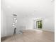 Bright and airy loft area with large window and wood floors at 5341 Lake Pearl Ct, Tampa, FL 33625