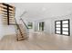 Modern floating staircase with glass and wood accents at 5341 Lake Pearl Ct, Tampa, FL 33625