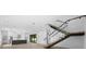 Open concept living room with modern staircase and hardwood floors at 5341 Lake Pearl Ct, Tampa, FL 33625