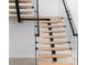 Contemporary floating staircase with glass and wood at 5341 Lake Pearl Ct, Tampa, FL 33625