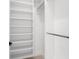 Spacious closet with built-in shelving and hanging rods at 5341 Lake Pearl Ct, Tampa, FL 33625