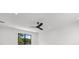 Bright bedroom with ceiling fan and large window at 5341 Lake Pearl Ct, Tampa, FL 33625