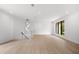 Bonus room features hardwood floors and a modern light fixture at 5341 Lake Pearl Ct, Tampa, FL 33625
