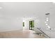 Spacious bonus room with hardwood floors and large windows at 5341 Lake Pearl Ct, Tampa, FL 33625