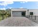 Spacious rooftop deck with modern tile and railings at 5341 Lake Pearl Ct, Tampa, FL 33625