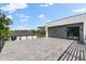 Spacious rooftop deck with modern tile and railings at 5341 Lake Pearl Ct, Tampa, FL 33625