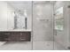 Contemporary bathroom with double sinks and a large shower at 5341 Lake Pearl Ct, Tampa, FL 33625