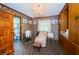 Sitting room with a recliner and built-in shelving at 2271 Keystone Rd, Tarpon Springs, FL 34688