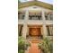 Close-up view of two-story brick house entrance at 2271 Keystone Rd, Tarpon Springs, FL 34688