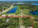 Aerial view of property near water and highway at 2271 Keystone Rd, Tarpon Springs, FL 34688