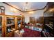 Study room with wood cabinets and display cases at 2271 Keystone Rd, Tarpon Springs, FL 34688