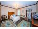 Cozy bedroom with wooden furniture and brick flooring at 2271 Keystone Rd, Tarpon Springs, FL 34688