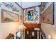 View from above of the home's entryway with stained glass and unique decor at 2271 Keystone Rd, Tarpon Springs, FL 34688