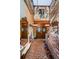 Grand entry with stained glass, brick floors, and a unique chandelier at 2271 Keystone Rd, Tarpon Springs, FL 34688