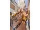 Grand entryway with brick staircase and chandelier at 2271 Keystone Rd, Tarpon Springs, FL 34688