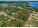 Aerial view of waterfront property with a large lot at 2271 Keystone Rd, Tarpon Springs, FL 34688
