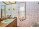 Small bathroom with a sink and tiled walls at 2271 Keystone Rd, Tarpon Springs, FL 34688