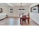 Dining room with hardwood floors and open concept floorplan at 404 Darcy Bluff Pl, Valrico, FL 33594