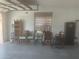 Garage with shelving, workbench and storage at 4115 Murfield E Dr, Bradenton, FL 34203
