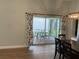 Enclosed patio with table and chairs, accessed from dining area at 4115 Murfield E Dr, Bradenton, FL 34203