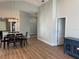 Bright dining room with hardwood floors and modern chandelier at 4115 Murfield E Dr, Bradenton, FL 34203
