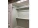 Walk-in closet with double rods and shelving at 4115 Murfield E Dr, Bradenton, FL 34203