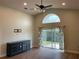 Spacious living room with hardwood floors and sliding glass doors at 4115 Murfield E Dr, Bradenton, FL 34203