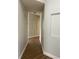 Light-filled hallway with hardwood floors and recessed niches at 4115 Murfield E Dr, Bradenton, FL 34203