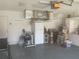 Attached garage with storage and AC unit at 4115 Murfield E Dr, Bradenton, FL 34203