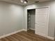 Bedroom with wood flooring, ceiling fan, and large closet at 4115 Murfield E Dr, Bradenton, FL 34203