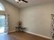 Living room with hardwood floors, high ceilings and a ceiling fan at 4115 Murfield E Dr, Bradenton, FL 34203