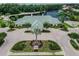 Community Beach Club with circular driveway and lush landscaping at 17809 Saint Lucia Isle Dr, Tampa, FL 33647