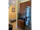 Kitchen with stainless steel refrigerator and bench seating at 32502 Summerglade Dr, Wesley Chapel, FL 33545