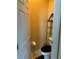 Powder room with toilet and shelving unit at 32502 Summerglade Dr, Wesley Chapel, FL 33545