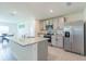 Modern kitchen with stainless steel appliances and granite counters at 810 Ace Outlaw Ave, Ruskin, FL 33570