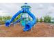Colorful playground structure with two slides and climbing features at 810 Ace Outlaw Ave, Ruskin, FL 33570