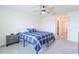 Spacious bedroom with a double bed and ceiling fan at 810 Ace Outlaw Ave, Ruskin, FL 33570