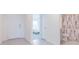 Home entryway with view of bedroom and bathroom at 810 Ace Outlaw Ave, Ruskin, FL 33570