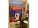 Bathroom with toilet, sink, and a graphic shower curtain at 32502 Summerglade Dr, Wesley Chapel, FL 33545