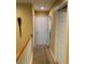 Upstairs hallway with carpet and neutral walls at 32502 Summerglade Dr, Wesley Chapel, FL 33545