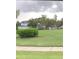 Community park with playground equipment and green space at 32502 Summerglade Dr, Wesley Chapel, FL 33545