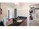 Bathroom with granite countertop and single sink vanity at 184 Valencia Cir, St Petersburg, FL 33716