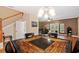 View of the dining area, kitchen, and living room from the stairs at 184 Valencia Cir, St Petersburg, FL 33716