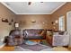 Bright living room featuring comfortable seating and a neutral color palette at 184 Valencia Cir, St Petersburg, FL 33716