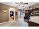 Spacious bedroom with a large bed, TV, and built-in desk at 184 Valencia Cir, St Petersburg, FL 33716