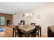 Bright dining area with a square table and four chairs at 184 Valencia Cir, St Petersburg, FL 33716