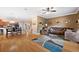 Open floor plan living room and kitchen area with hardwood floors at 184 Valencia Cir, St Petersburg, FL 33716