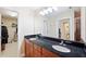 Bathroom with double vanity and granite countertop at 184 Valencia Cir, St Petersburg, FL 33716